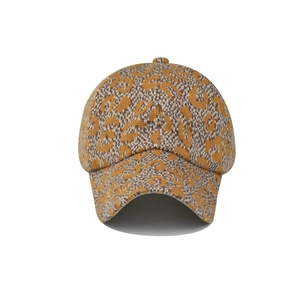 Detailed front view of thick knit leopard print baseball cap with curved brim