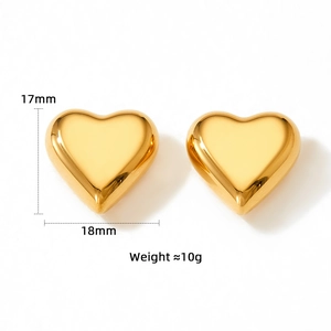 Detail view of gold heart earrings with 17mm x 18mm dimensions and 10g weight