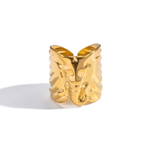 Polished gold elephant wrap ring featuring intricate texture and adjustable open band design