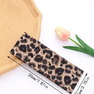 Elastic leopard print headband for sports and yoga, measuring 20cm by 7cm