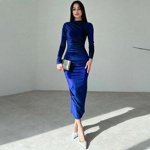 Detailed view of long sleeve bodycon dress in royal blue velvet with side ruching