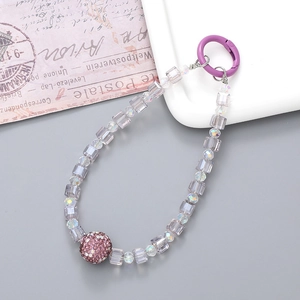 Detail view of purple beaded phone strap with rhinestone ball and spring hook