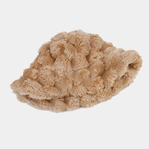 Detailed close-up of khaki faux rabbit fur bucket hat with textured pineapple pattern
