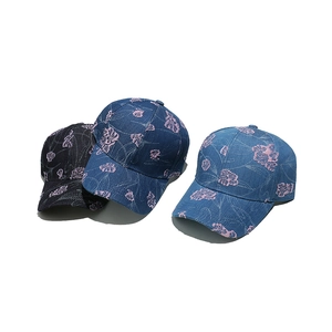 Summer baseball caps with pink flower embroidery in black, dark blue, and light blue