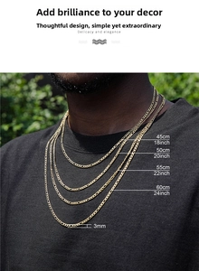 3mm gold Figaro chain shown on model in 18 to 24 inch lengths for men and women