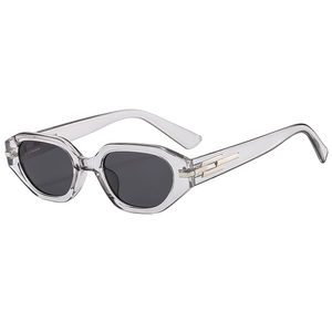 Fashion cat-eye sunglasses with transparent grey frames and black lenses shown at 45 degrees