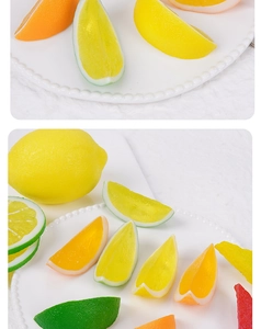 Close-up of realistic PVC fruit slices showing detailed pulp texture of lemon and orange