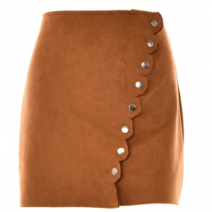 Detail of brown faux suede mini skirt with wavy front hem and silver button closure