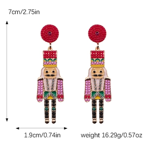 Detailed view of nutcracker drop earrings showing exact height and width measurements