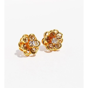 Exquisite golden flower stud earrings featuring blue crystal petals and cubic zirconia accents