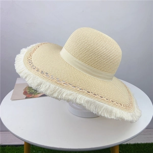 Cappello da sole a tesa larga da donna con bordi a frange e nastro per spiaggia e viaggi