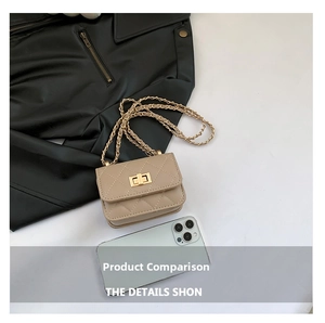 Detailed close-up of quilted chain bag showing mini size next to a smartphone