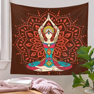 Detailed view of bohemian mandala meditation tapestry hanging on a cozy bedroom wall