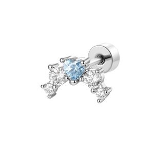 Silver steel cartilage stud with blue heart zircon and round stones on white background