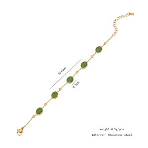 Detail of gold stainless steel bracelet with green oval gemstones and dimension labels