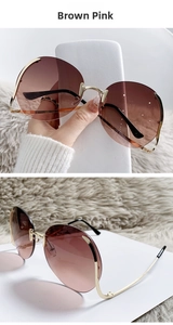 Detail of rimless brown pink gradient sunglasses with golden metal temples and soft case