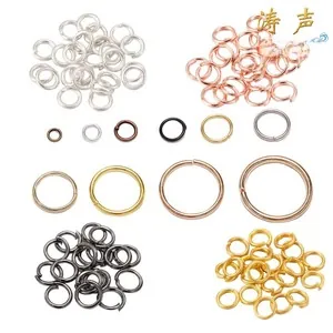 Assorted open jump rings in multiple sizes and metallic colors for jewelry making