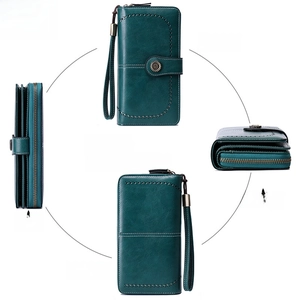Deep green RFID blocking long zipper wallet for women with wrist strap and textured leather