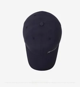Top view of a navy blue breathable baseball cap with narason side logo and curved brim