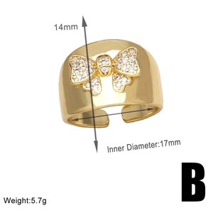 Detailed specs of the gold bow ring with size 17mm diameter and 14mm width dimensions