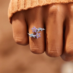 Elegant S925 sterling silver flower ring with purple gems and blue leaves for women