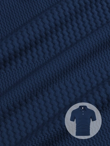 Macro shot of dark blue textured knit fabric on a men's polo shirt with sharp details