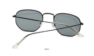 Back view of square metal sunglasses with grey lenses and flexible silicone tips