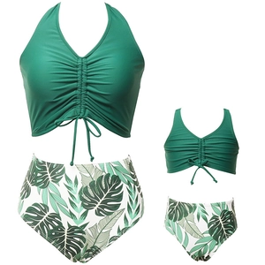 Set bikini coordinato madre-figlia verde scuro con slip a vita alta stampa tropicale