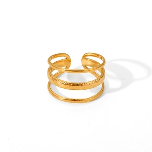 Detailed view of triple-layered gold stainless steel ring with hammered texture finish