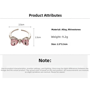 Detailed size chart of the silver ring with pink heart rhinestones and bow design