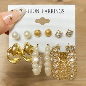 6-piece geometric gold earring set with pearls and rhinestones shown on card