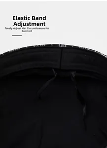 Detail view of adjustable elastic band and black ribbon inside the plaid newsboy cap