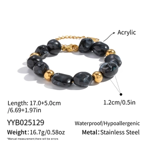 Irregular dark grey marbled acrylic bead bracelet with gold stainless steel accents