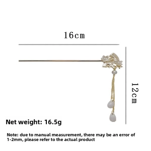Detailed view of 16cm golden fan hair pin with pearls and 12cm tassel measurements