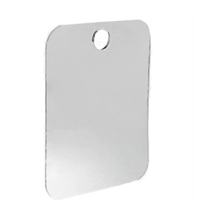 Detail of rectangular acrylic shaving mirror with rounded corners and hanging hole