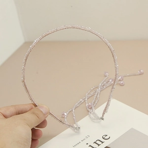 Elegant lavender beaded headband with asymmetrical crystal fringe and pink pearl charm