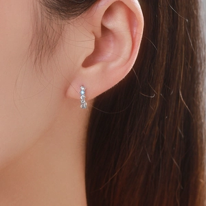 S925 sterling silver hoop earrings with blue and white zircon crystals on female ear