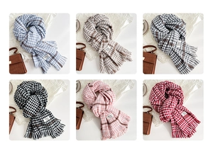 Detailed grid of houndstooth cashmere feel scarves with tassels in six vibrant colors