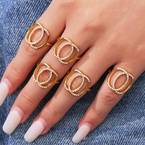 Five-piece gold stackable rings set with 5A cubic zirconia and geometric double circles