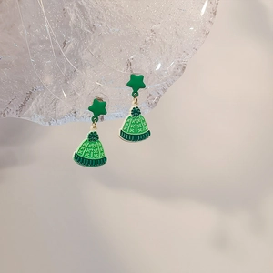 Christmas tree earrings with green knit hat design and star studs for holiday style