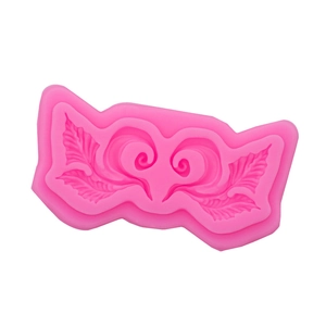 Pink silicone fondant mold with European lace scroll patterns for cake decorating