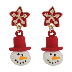 Detail shot of Christmas earrings featuring Santa and reindeer with enamel finish