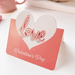 Pink and white 3D heart Valentine's Day greeting card with metallic love text