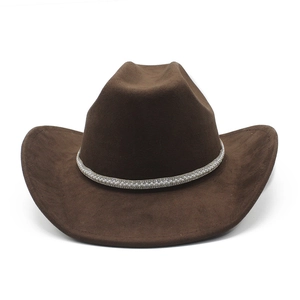 Detail of a brown suede cowboy hat with a luxurious pearl and rhinestone hatband