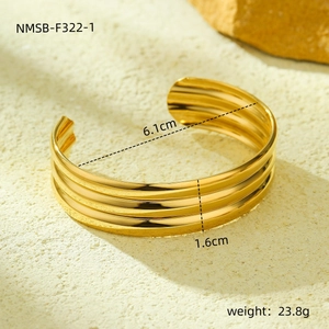Detail view of a multi-layer gold titanium steel cuff bracelet with precise dimensions