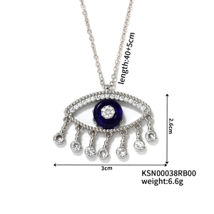 Detailed view of evil eye necklace with blue zircon and size specs 3cm by 2.6cm