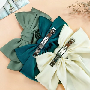 Morandi large satin bow hair clips in dark green and cream with spring metal fastener