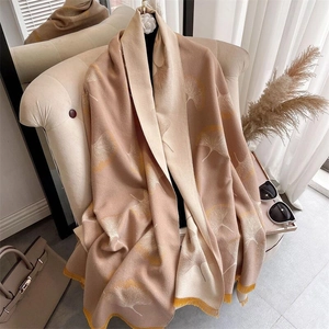 Beige and brown double-sided cashmere scarf with ginkgo leaf patterns and fringe edges