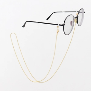 Elegant gold snake chain eyewear lanyard with non-slip silicone loops on white background