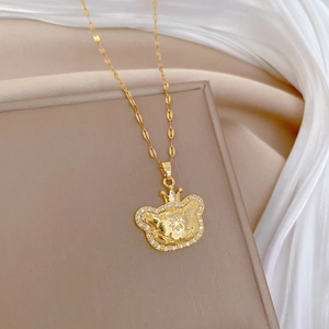 Elegant gold crown cat necklace with sparkling crystals on a delicate flat chain